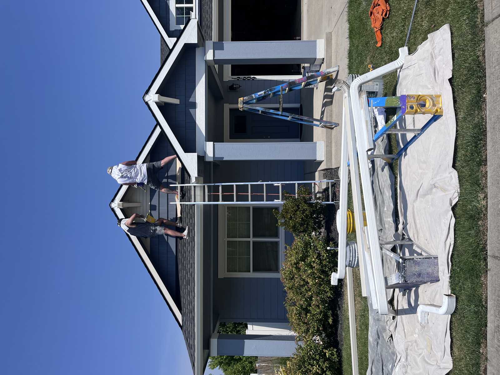 Omni Painting LLC crew painting roofline trim Spokane WA