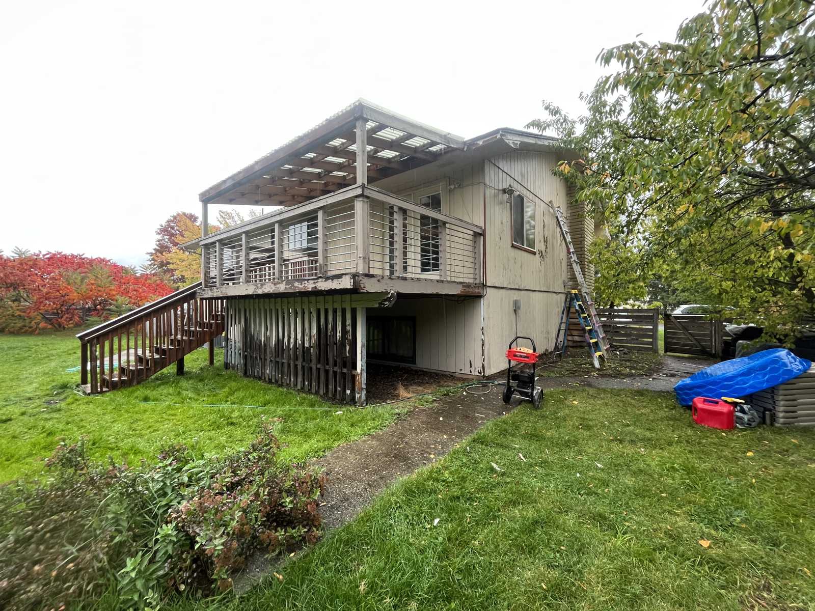 House exterior before painting — worn faded siding Spokane WA