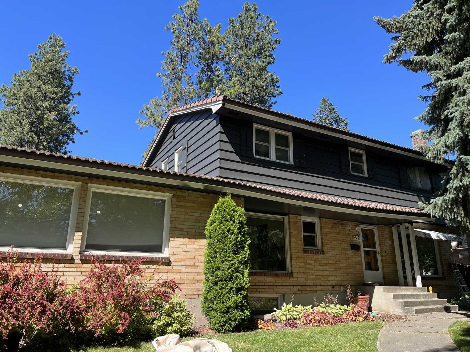 Grey exterior siding painting Cheney WA