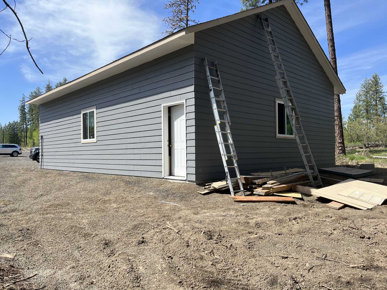 Exterior grey siding painting Spokane WA